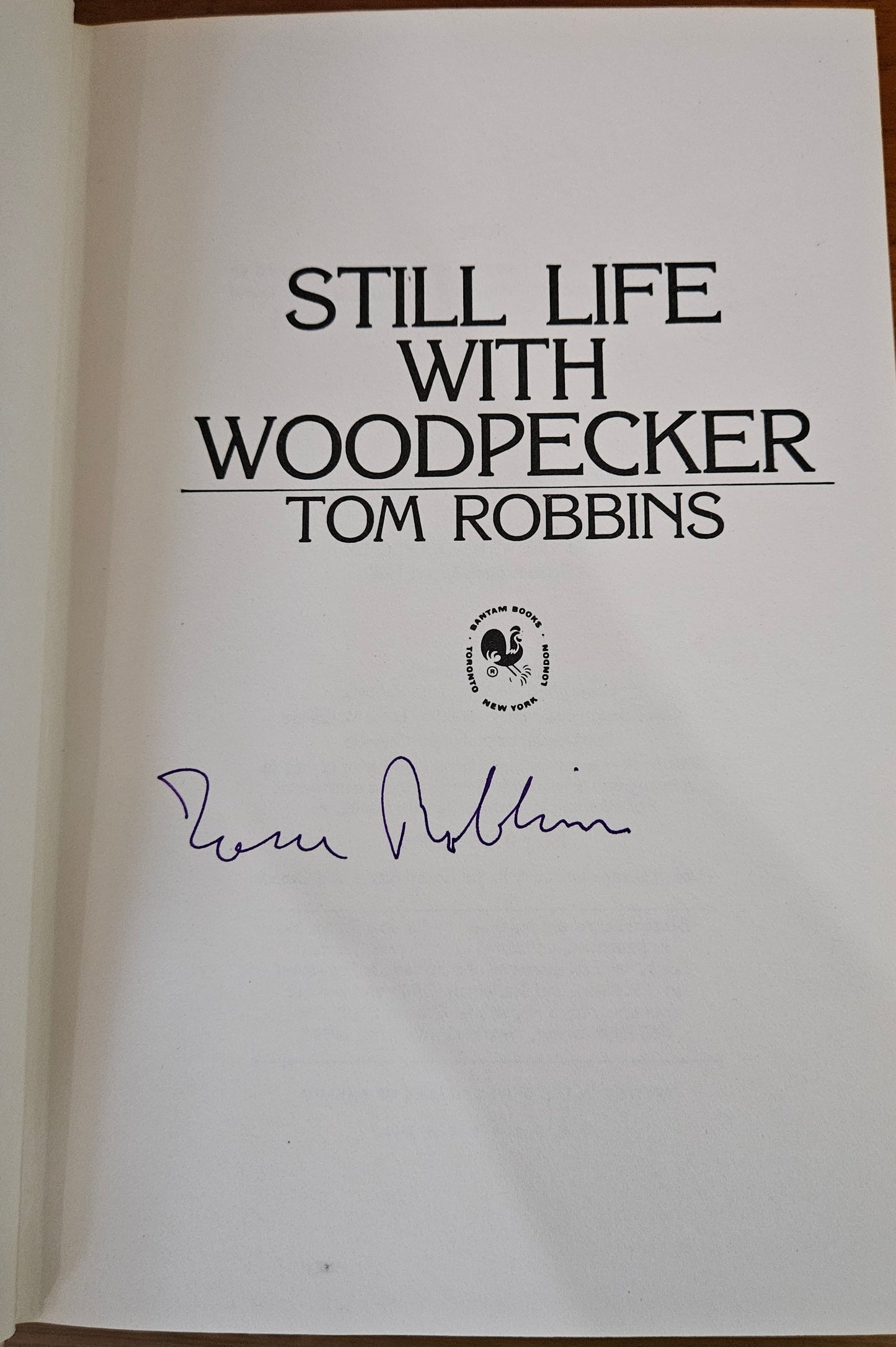 Tom Robbins - Still Life With Woodpecker (signed)